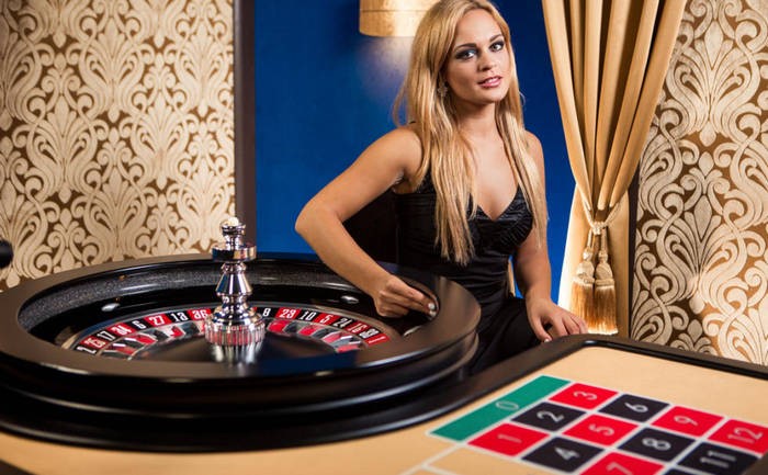 A live roulette dealer