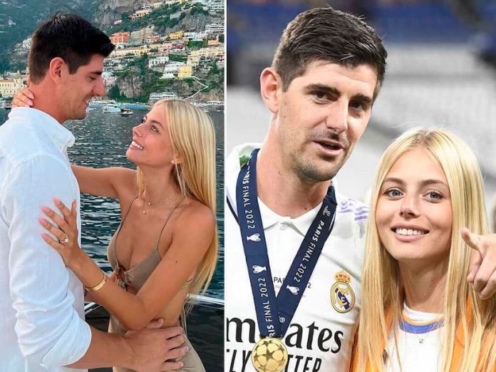 Courtois and wife