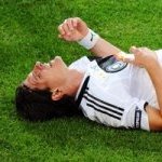 German forward Mario Gomez (back) lays on the field next to teammate German defender Clemens Fritz during their Euro 2008 Championships Group B football match Germany vs. Poland on June 8, 2008 at Woerthersee stadium in Klagenfurt, Austria. (AFP/Getty Images)