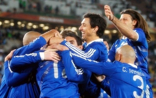 Martin Palermo celebrates with his teammates