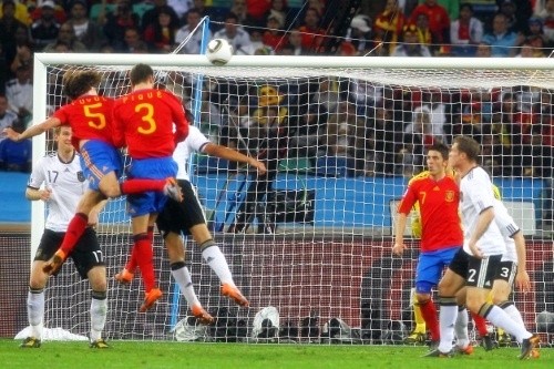 Carles Puyol leaped high to head in the winner