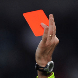 Referee shows a red card