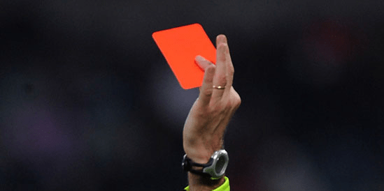 Referee shows a red card