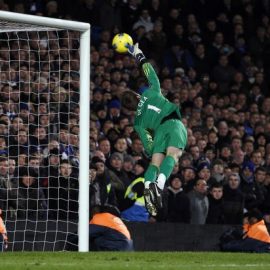 Manchester United's goalkeeper David de Gea makes a save during their English Premier League soccer match against Chelsea at Stamford Bridge in London