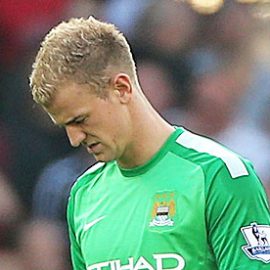 Manchester City's Joe Hart walks off the pitch dejected after the 3-2 defeat at Cardiff City Stadium