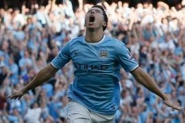 Manchester City's Samir Nasri celebrates scoring in the 4-1 win over Manchester United.