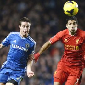 Chelsea's Azpilicueta challenges Liverpool's Suarez during their English Premier League soccer match at Stamford Bridge in London
