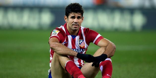 hi-res-461824909-diego-costa-of-atletico-de-madrid-sits-on-the-ground_crop_north