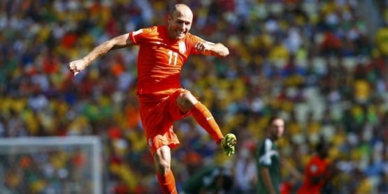Arjen Robben of the Netherlands celebrates after winning their 2014 World Cup round of 16 game against Mexico at the Castelao arena in Fortaleza