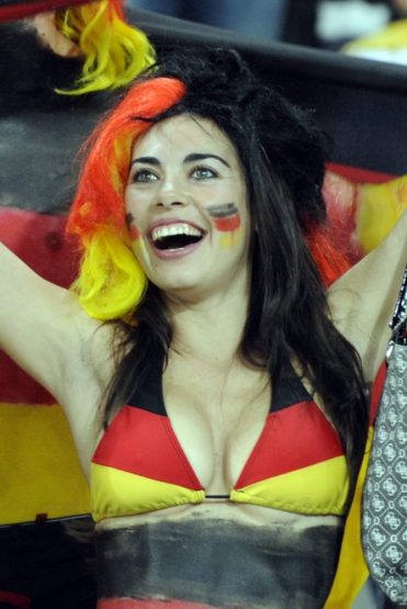 germany fans with world cup german flag tattoo on face-f23806