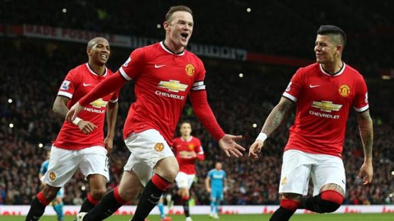 Rooney celebrating with team