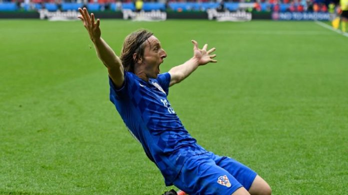 Luka Modric celebrates after scoring a goal vs.  Turkey