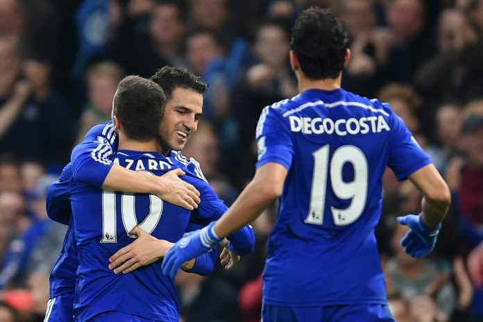 LONDON, ENGLAND - NOVEMBER 22: Cesc Fabregas of Chelsea hugs Eden Hazard of Chelsea after he scored their second goal during the Barclays Premier League match between Chelsea and West Bromwich Albion at Stamford Bridge on November 22, 2014 in London, England. (Photo by Tom Dulat/Getty Images)