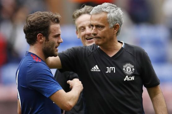 Manchester United's Juan Mata and Jose Mourinho