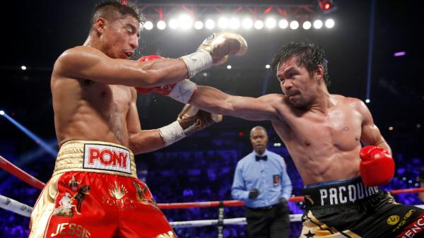 Manny Pacquiao dominating Jessie Vargas in their world title fight.