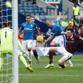 Kenny Miller scores for Rangers against Hearts in a 3-1 win.