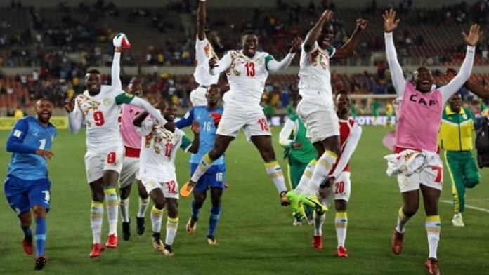 senegal_soccer_players_celebrate_their_win_over_south_africa._reuters