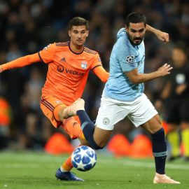 houssem-aouar-of-lyon-is-challenged-by-ilkay-gundogan-of-manchester-picture-id1036074014