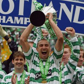 henrik-larsson-and-his-celtic-team-mates-celebrate-after-being-with-picture-id50794501