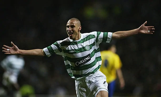 henrik-larsson-of-celtic-celebrates-scoring-the-first-goal-for-celtic-picture-id3266746