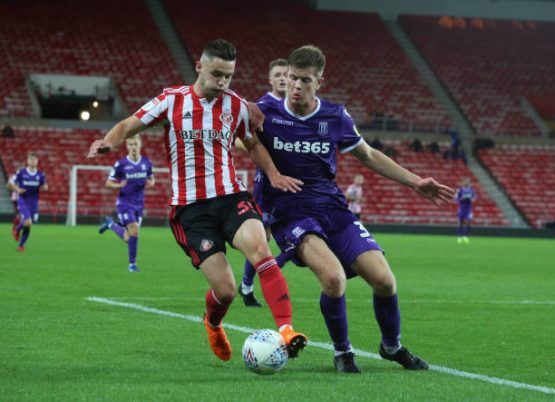 luke-molyneux-of-sunderland-takes-on-nathan-collins-of-stoke-during-picture-id1031344924