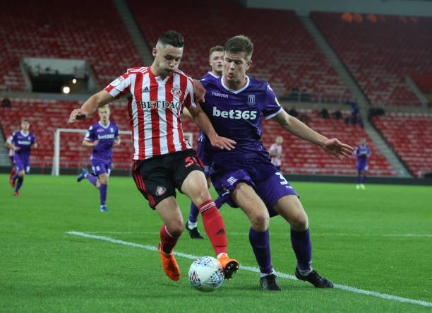 luke-molyneux-of-sunderland-takes-on-nathan-collins-of-stoke-during-picture-id1031344924