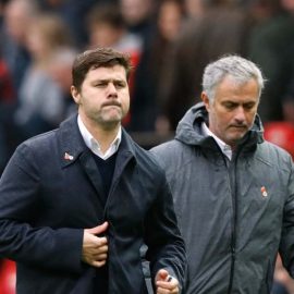 Pochettino-and-Mourinho-walk-the-touchline-at-Old-Trafford