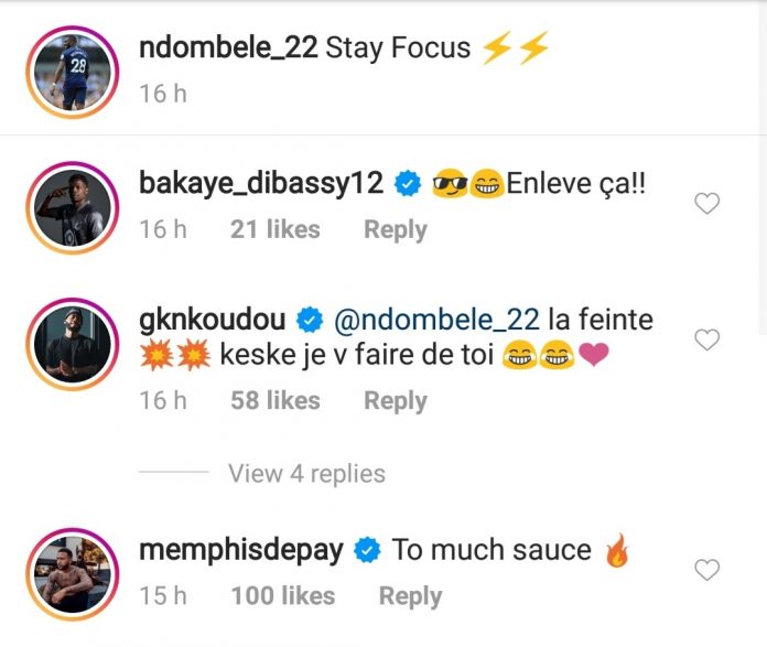 Memphis Depay reacts to Tottenham Hotspur's Tanguy Ndombele training video