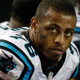 rsz greg hardy sits on bench as member of carolina panthers