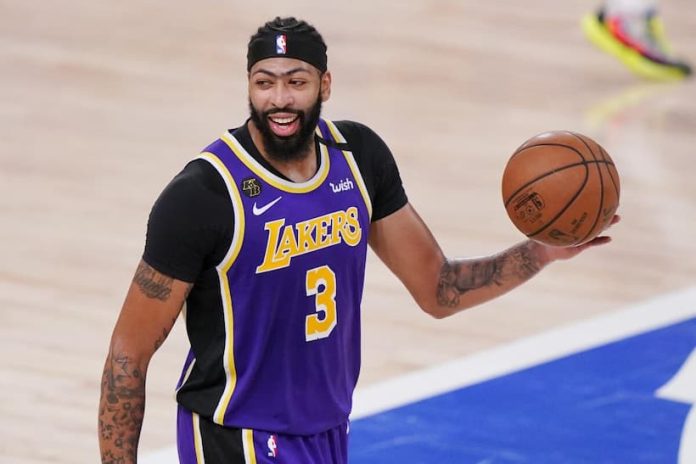 Lakers’ Anthony Davis (back) insists he will be available for the play-in tournament tonight