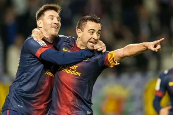 Lionel Messi and Xavi