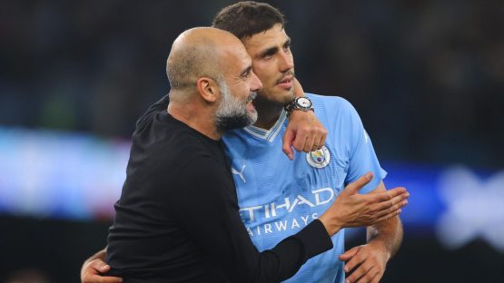 Manchester City Pep Guardiola and Rodri