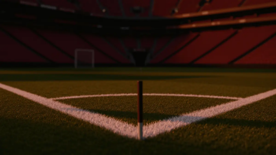 Empty stadium corner flag at dusk with burgundy and black lighting, emerald pitch markings, shallow depth of field.