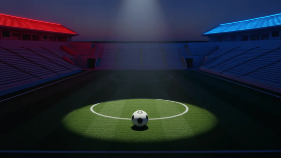 Empty floodlit stadium corner section with red and blue accent lighting, single football on centre spot under spotlight.