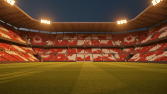 Modern floodlit football stadium at dusk with red and white flag colours in stands, empty pitch with shadow patterns, wide angle shot.